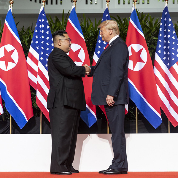 Kim_and_Trump_shaking_hands_at_the_red_carpet_during_the_DPRK–USA_Singapore_Summit
